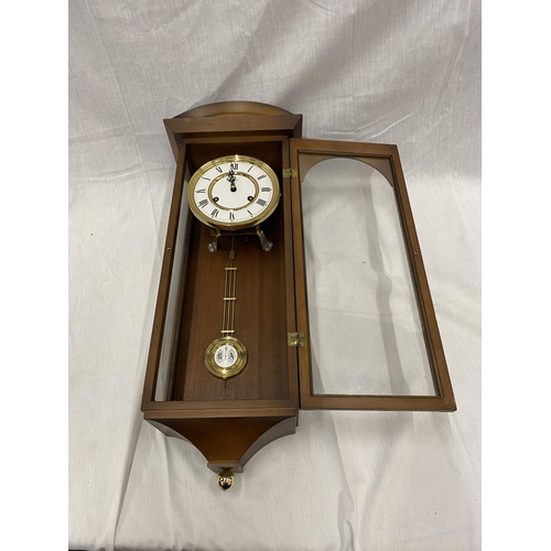 45A - A MAHOGANY CASED WALL CLOCK