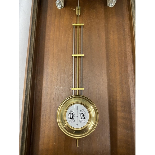 45A - A MAHOGANY CASED WALL CLOCK