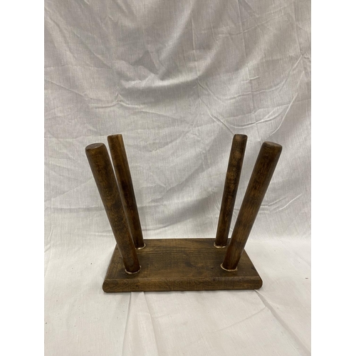 46 - A VINTAGE OAK RECTANGULAR FOUR LEGGED STOOL