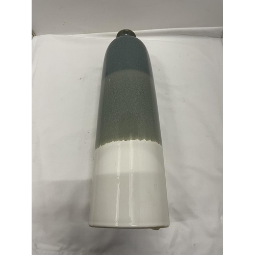 460 - A LARGE VASE IN GREEN AND CREAM HEIGHT 47CM AND A LARGE STUDIO POTTERY JUG HEIGHT 35CM