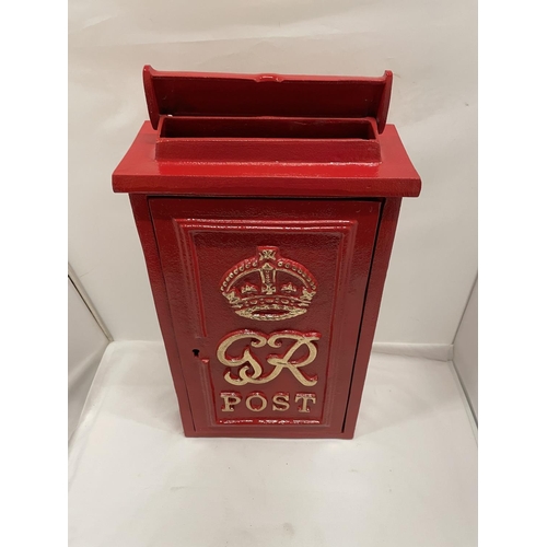 461 - A RED WALL MOUNTED GR POSTBOX WITH KEYS HEIGHT 45CM