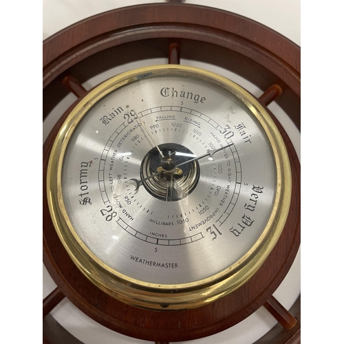 463 - A VINTAGE STYLE OAK SHIPS WHEEL BAROMETER DIAMETER APPROX 48CM