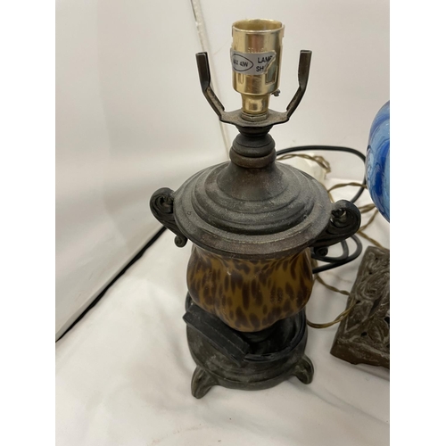 466 - AN OIL LAMP WITH BLUE GLASS, PLUS TWO TABLE LAMPS