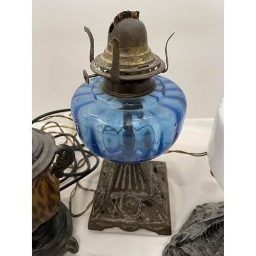 466 - AN OIL LAMP WITH BLUE GLASS, PLUS TWO TABLE LAMPS