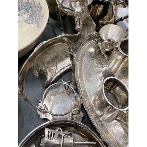 486 - A QUANTITY OF SILVER PLATED ITEMS TO INCLUDE TEA AND COFFEE POTS, GOBLET, A STAG DISH, GALLERIED TRA... 