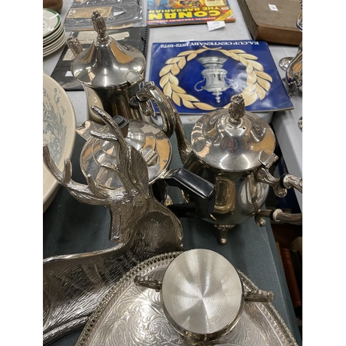 486 - A QUANTITY OF SILVER PLATED ITEMS TO INCLUDE TEA AND COFFEE POTS, GOBLET, A STAG DISH, GALLERIED TRA... 