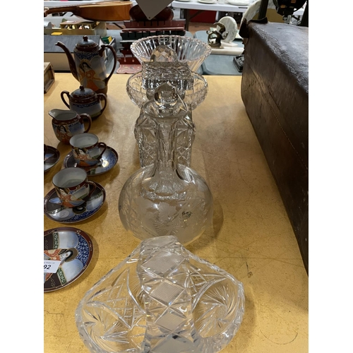 491 - A QUANTITY OF LEAD CUT CRYSTAL GLASS TO INCLUDE DECANTERS, BOWLS AND A BASKET