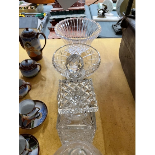 491 - A QUANTITY OF LEAD CUT CRYSTAL GLASS TO INCLUDE DECANTERS, BOWLS AND A BASKET