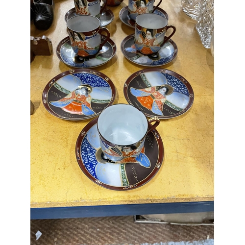 492 - AN ORIENTAL STYLE COFFEE SET TO INCLUDE COFFEE POT, SUGAR BOWL, CREAM JUG, CUPS AND SAUCERS