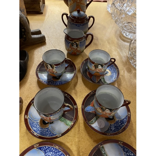 492 - AN ORIENTAL STYLE COFFEE SET TO INCLUDE COFFEE POT, SUGAR BOWL, CREAM JUG, CUPS AND SAUCERS