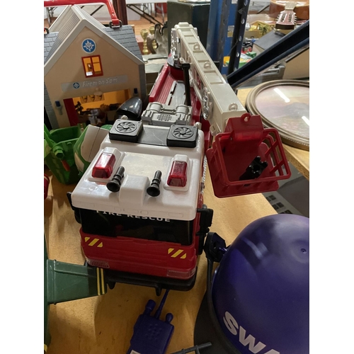 494 - A VARIETY  OF TOY VEHICLES TO INCLUDE A FIRE ENGINE, SPIDER MOBILE, AMBULANCE, AEROPLANE TOGETHER WI... 