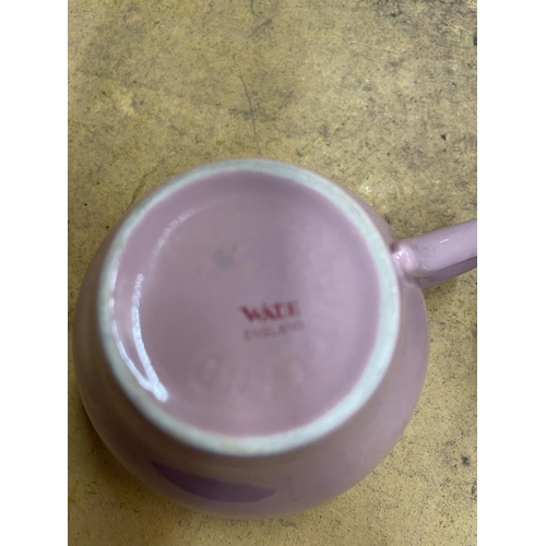 495 - A QUANTITY OF WADE PINK AND FLORAL TEAWARE TO INCLUDE TRIOS, CREAM JUG, SUGAR BOWL, AND SANDWICH PLA... 