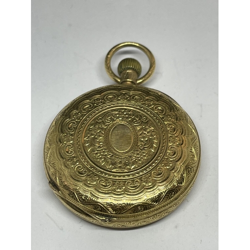 502 - A HALLMARKED CHESTER 18 CARAT GOLD LADIES POCKET WATCH MARKED W LOCKWOOD, 3 VICTORIA LANE, HUDDERSFI... 