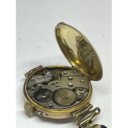 503 - A MARKED 9 CARAT GOLD CASED WATCH WITH LEATHER STRAP IN NEED OF REPAIR