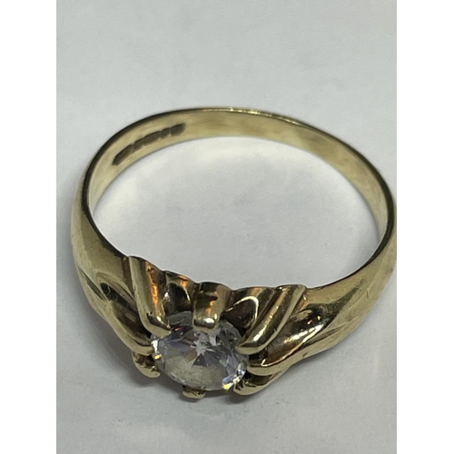 512 - A 9 CARAT GOLD RING WITH A SOLITAIRE CUBIC ZIRCONIA STONE SIZE K