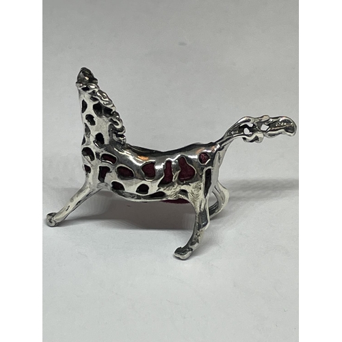 518 - A MARKED SILVER MINIATURE HORSE PIN CUSHION