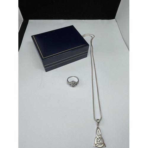 534 - A MARKED SILVER MACKINTOSCH NECKLACE WITH PENDANT AND A RING