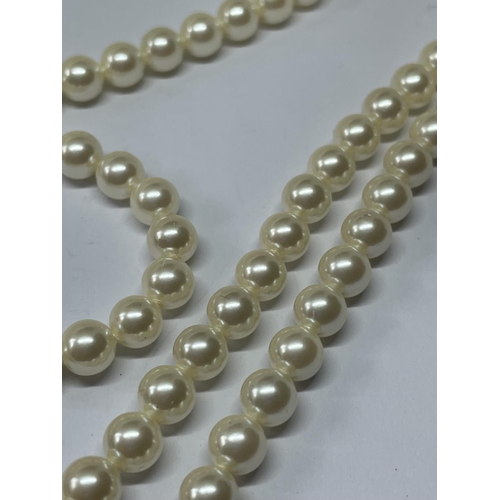 537 - A LONG STRAND OF LOTUS PEARLS IN A PRESENTATION BOX