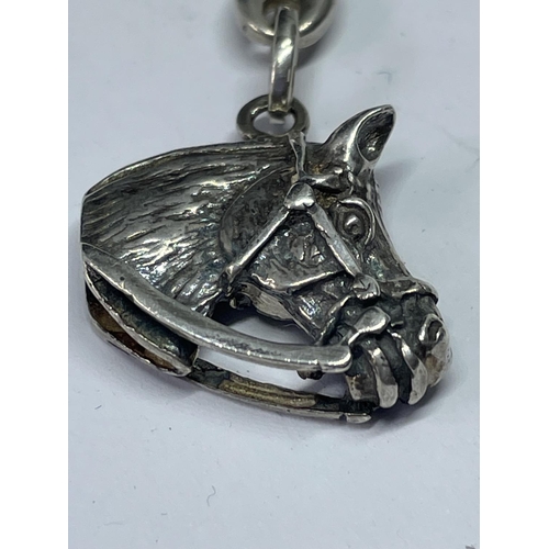 548 - A SILVER HORSES HEAD KEY RING