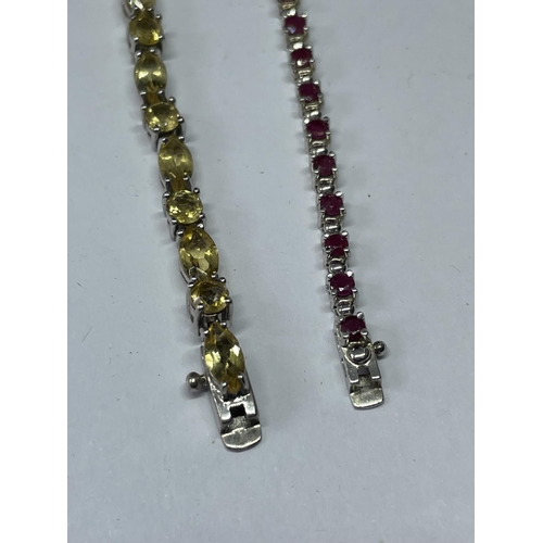 549 - TWO MARKED SILVER BRACELETS ONE WITH GARNETS AND ONE WITH CITRINES IN A PRESENTATION BOX