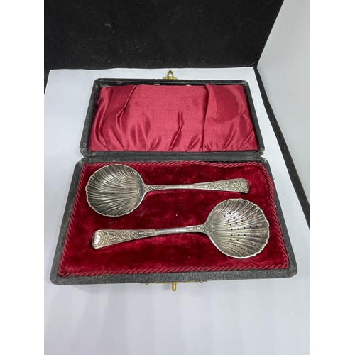 550 - A BOXED SET OF TWO SILVER PLATED SPOONS