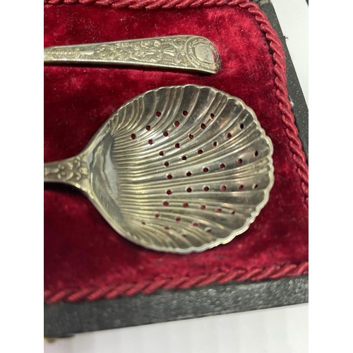 550 - A BOXED SET OF TWO SILVER PLATED SPOONS