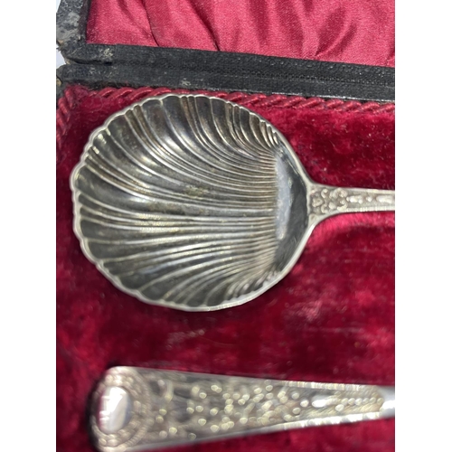 550 - A BOXED SET OF TWO SILVER PLATED SPOONS