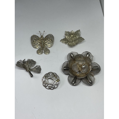 555 - FIVE DECORATIVE SILVER BROOCHES