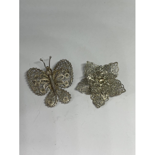 555 - FIVE DECORATIVE SILVER BROOCHES