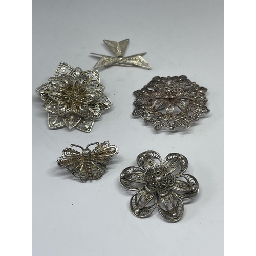 559 - FIVE DECORATIVE SILVER BROOCHES