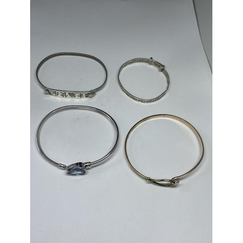 560 - FOUR VARIOUS MARKED SILVER BANGLES