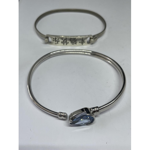 560 - FOUR VARIOUS MARKED SILVER BANGLES