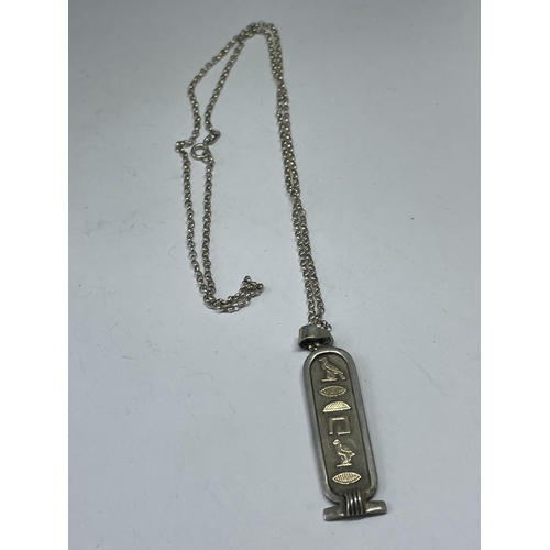 571 - A SILVER AND GOLD INGOT ON A CHAIN WITH A PRESENTATION BOX