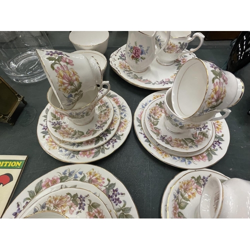 64 - A QUANTITY OF CHINA TEAWARE TO INCLUDE PARAGON 'COUNTRY LANE' TRIOS, PLATES, SUGAR BOWL AND CREAM JU... 