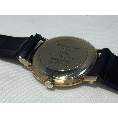 502A - AN OMEGA GENTLEMAN'S WRIST WATCH WITH 9 CARAT GOLD CASE AND LEATHER STRAP (ENGRAVED TO THE BACK PLAT... 