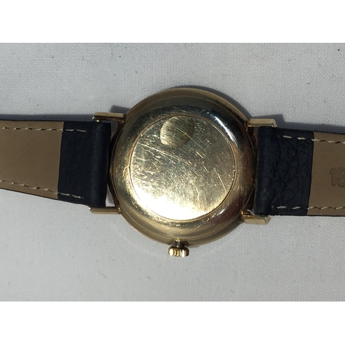 503A - AN OMEGA GENTLEMAN'S WRIST WATCH WITH 9 CARAT GOLD CASE AND LEATHER STRAP