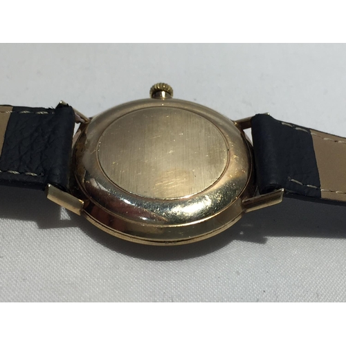 503A - AN OMEGA GENTLEMAN'S WRIST WATCH WITH 9 CARAT GOLD CASE AND LEATHER STRAP