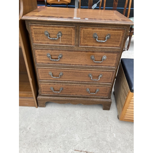 2451 - A REPRODUCTION MAHOGANY AND CROSS BANDED CHEST OF TWO SHORT AND THREE LONG DRAWERS 24.5