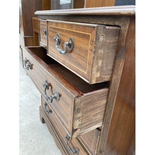 2451 - A REPRODUCTION MAHOGANY AND CROSS BANDED CHEST OF TWO SHORT AND THREE LONG DRAWERS 24.5