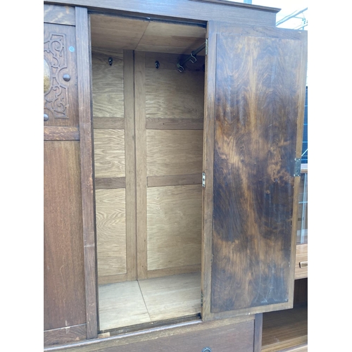 2453 - AN EARLY 20TH CENTURY OAK MIRRORED DOOR WARDROBE 47