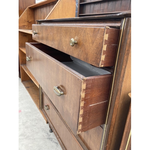 2457 - AN AUSTIN SUITE CHEST OF FOUR DRAWERS 31.5