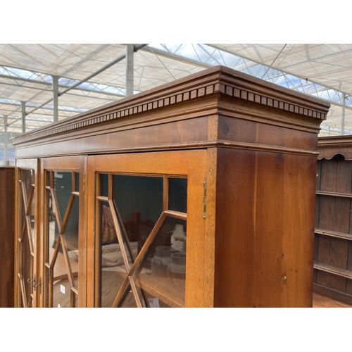 2460 - A MODERN YEW WOOD GLASED BOOKCASE ON BASE 56