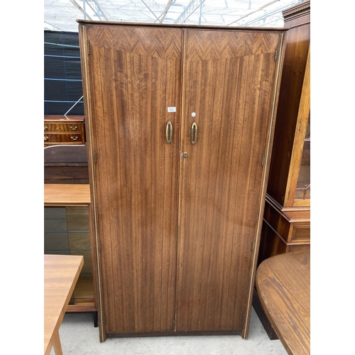 2461 - AN AUSTIN SUITE TWO DOOR WARDROBE 36