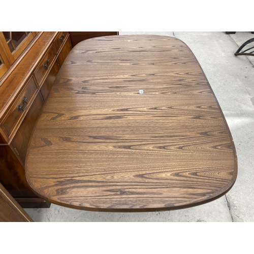 2463 - A RETRO G PLAN EXTENDING DINING TABLE 63