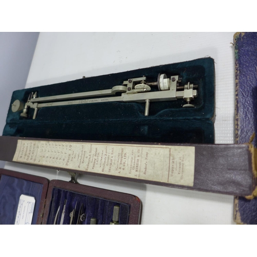 306 - A COLLECTION OF NAVAL ARCHITECTS DRAWING INSTRUMENTS, TO INCLUDE A PLANIMETER, RULERS, SLIDE RULES, ... 