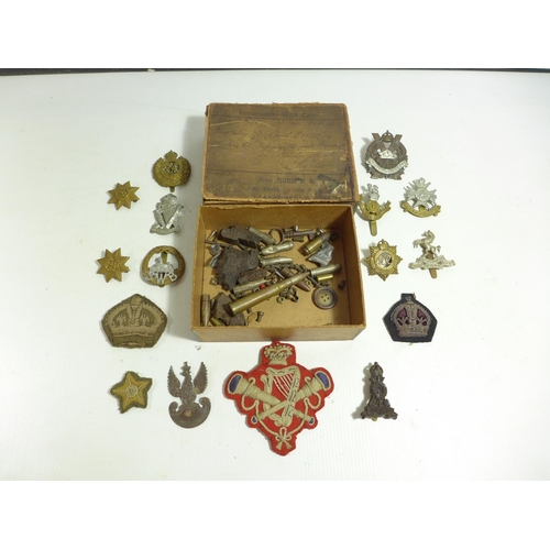 304 - A BOER WAR PERIOD BOX CONTAINING NUMEROUS WORLD WAR I AND WORLD WAR II BADGES TO INCLUDE POLISH ARMY... 