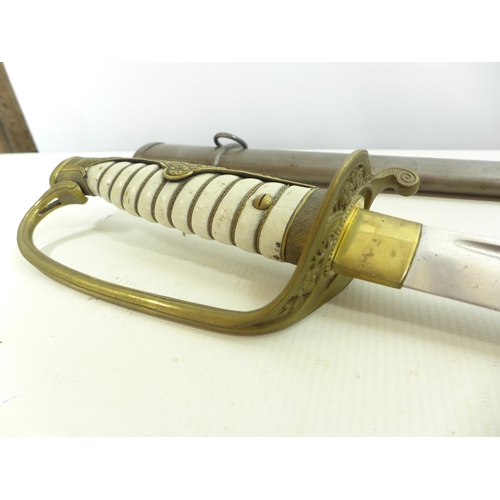 309 - A JAPANESE CAVALRY OFFICERS SWORD AND SCABBARD, 64CM BLADE, PIERCED BRASS GUARD