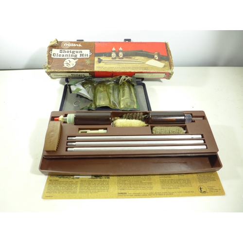 340 - AN OUTERS CASED SHOTGUN CLEANING KIT, AND A FURTHER GUN CLEANING KIT (2)