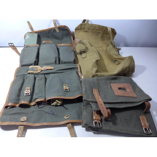 350 - A CANVAS BAG DATED 1943, AND A LARGE GUN CLEANING KIT (2)