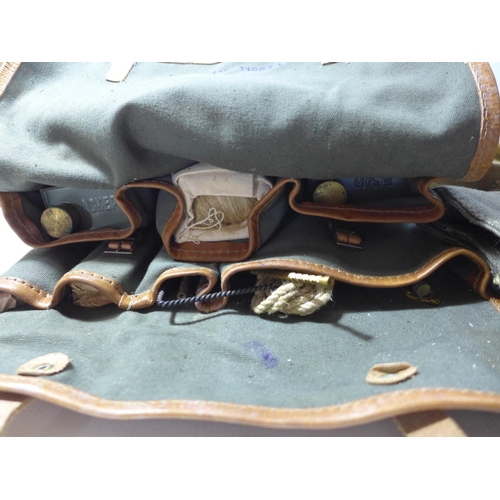 350 - A CANVAS BAG DATED 1943, AND A LARGE GUN CLEANING KIT (2)